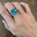 Round Blue Topaz and Half Eternity Diamond Cocktail Ring