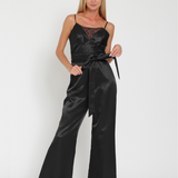 SLEEK SATIN LACE-TRIM JUMPSUIT IN MIDNIGHT BLACK.