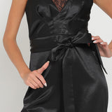 SLEEK SATIN LACE-TRIM JUMPSUIT IN MIDNIGHT BLACK.